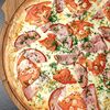 Фото к позиции меню Пицца Ветчина и томат