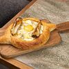 Фото к позиции меню Аджарули с сыром ашмело и печеной грушей