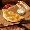 Фото к позиции меню Чебурек с картофелем и чесночным маслом