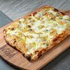 Фото к позиции меню Римская пицца Четыре сыра 25 на 35 см