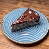 Фото к позиции меню Блинный торт Шоколадный