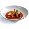 Фото к позиции меню Острый тосканский томатный суп с морепродуктами