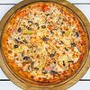 Фото к позиции меню Пицца с ветчиной и маслинами
