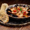 Фото к позиции меню Тосканский суп из морепродуктов