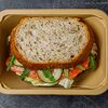 Фото к позиции меню Сэндвич с красной рыбой на цельнозерновом хлебе с семенами чиа