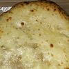 Фото к позиции меню Пирог осетинский с сыром и грибами большой