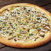 Фото к позиции меню Пицца с грибами и трюфельным кремом 24 см