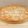Фото к позиции меню Пицца с креветками, лососем и сыром фетаки