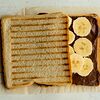 Фото к позиции меню Сэндвич с бананом и нутеллой