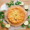 Фото к позиции меню Осетинский пирог с картофелем, сыром и зеленью 30 см