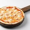 Фото к позиции меню Пицца с лососем на ржаном тесте