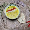 Фото к позиции меню Овощной крем суп с карри и кокосовым молоком