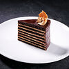 Фото к позиции меню Шоколадно-арахисовый торт (порция)