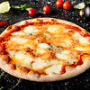 Фото к позиции меню Пицца Четыре сыра с томатным соусом