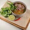 Фото к позиции меню Вьетнамский суп с говядиной и лапшой