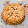 Фото к позиции меню Осетинский пирог с индейкой, сыром и грибами