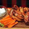 Фото к позиции меню Куриные крылья барбекю с морковью и сельдереем