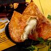 Фото к позиции меню Чебурек с сыром, помидором и зеленью