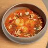 Фото к позиции меню Кокосово-томатный суп с тигровыми креветками