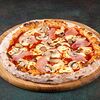 Фото к позиции меню Пицца с ветчиной, сыром и грибами