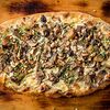 Фото к позиции меню Пицца с грибами и трюфельным соусом