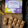 Фото к позиции меню Шоколад белый Nilambari на кокосе с гречишным чаем