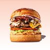 Фото к позиции меню Грибной бургер с котлетой из говядины, грибным жюльеном, жареным беконом и домашним трюфельным майонезом