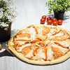 Фото к позиции меню Пицца с курицей и томатами