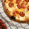 Фото к позиции меню Неаполитанская пицца Сальчича Крема