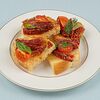Фото к позиции меню Итальянский тост с томатами