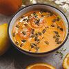 Фото к позиции меню Крем-суп из тыквы с тигровыми креветками