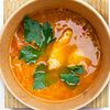 Фото к позиции меню Чечевичный суп с вялеными томатами и индейкой