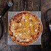 Фото к позиции меню Пицца с тремя сырами