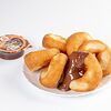 Фото к позиции меню Пончики с ореховой пастой Nutella