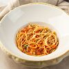 Фото к позиции меню Спагетти Неро с морепродуктами и спелыми томатами