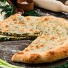 Фото к позиции меню Осетинский пирог с сыром и зеленым луком 30 см