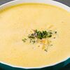Фото к позиции меню Кукурузный крем-суп с креветкой