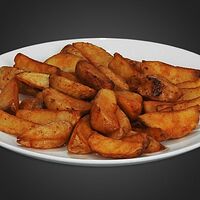 Дольки картофеля в специях, жаренные во фритюре