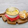 Фото к позиции меню Сырный крем-суп с креветками