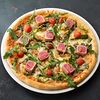 Фото к позиции меню Пицца с тунцом Yellowfin, шпинатом и томатами черри
