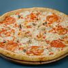Фото к позиции меню Пицца Неаполитано с морепродуктами