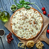 Фото к позиции меню Пицца груша с голубым сыром и мёдом