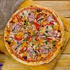 Фото к позиции меню Пицца Фирменная 2 соуса (25 см)