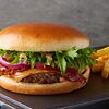 Фото к позиции меню Бургер с картофелем фри и сырным соусом