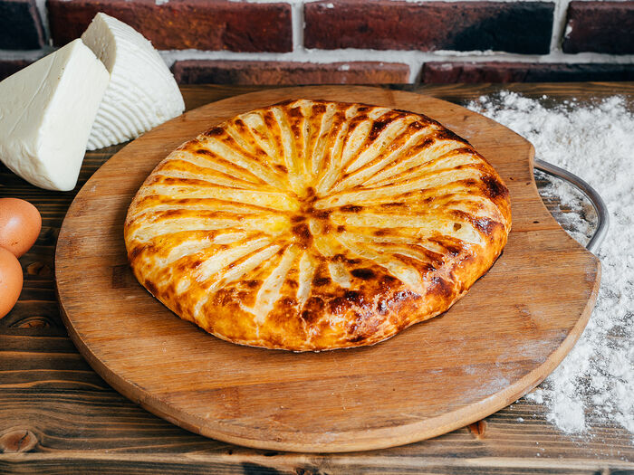 Осетинский пирог с сыром и помидорами