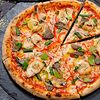 Фото к позиции меню Пицца с морепродуктами в тайском стиле