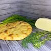 Фото к позиции меню Осетинский пирог с сыром и зеленью
