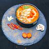 Фото к позиции меню Тайский острый суп Том Ям с курицей