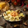 Фото к позиции меню Равиоли Классические с мидиями и креветками под сливочным соусом