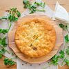 Фото к позиции меню Осетинский пирог с сыром и зеленью 30 см